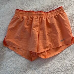 Nike Women's Vibrant Orange Athletic Shorts